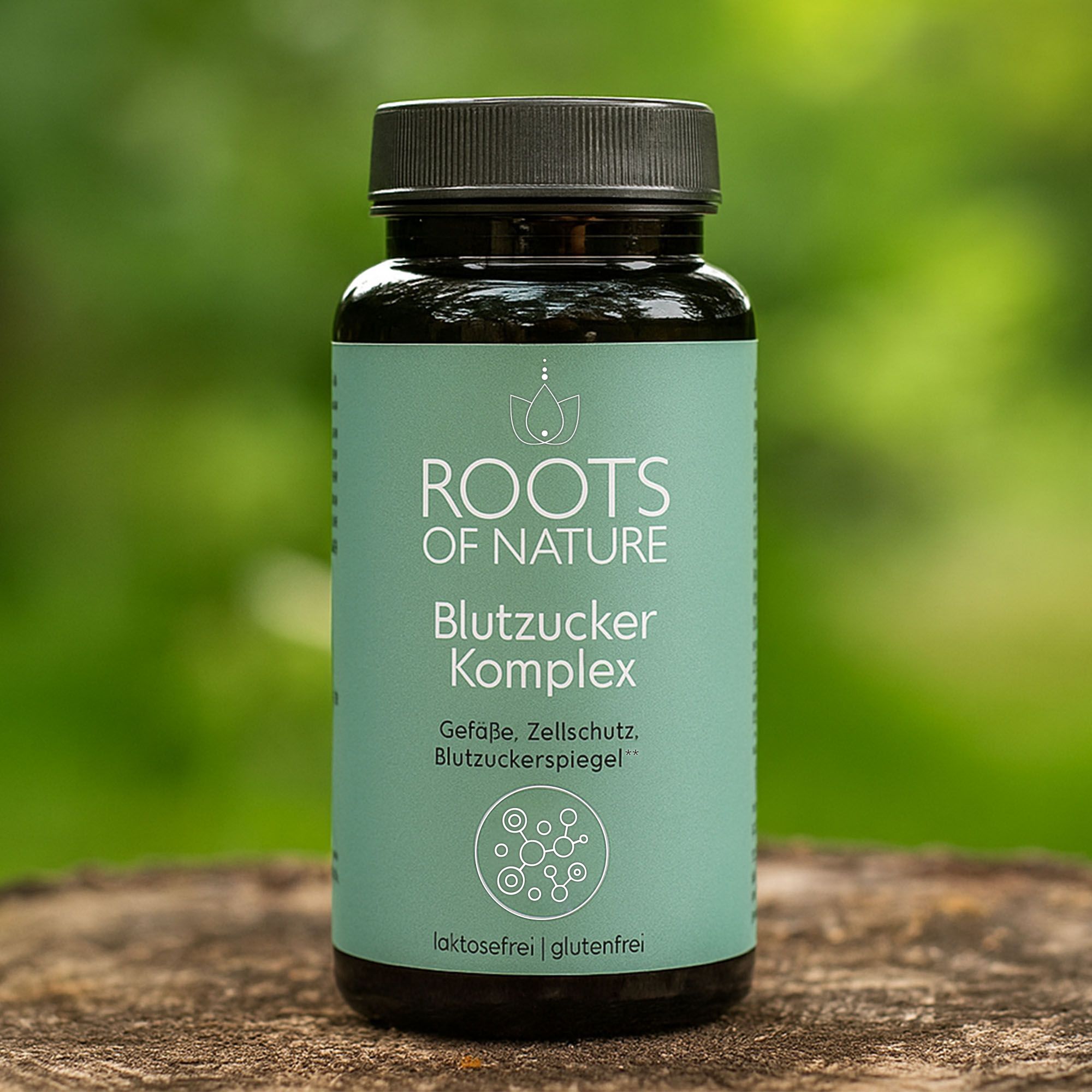 Grüne Flasche mit schwarzem Deckel. Text: ROOTS OF NATURE Blutzucker Komplex. Lakotsefrei, glutenfrei.