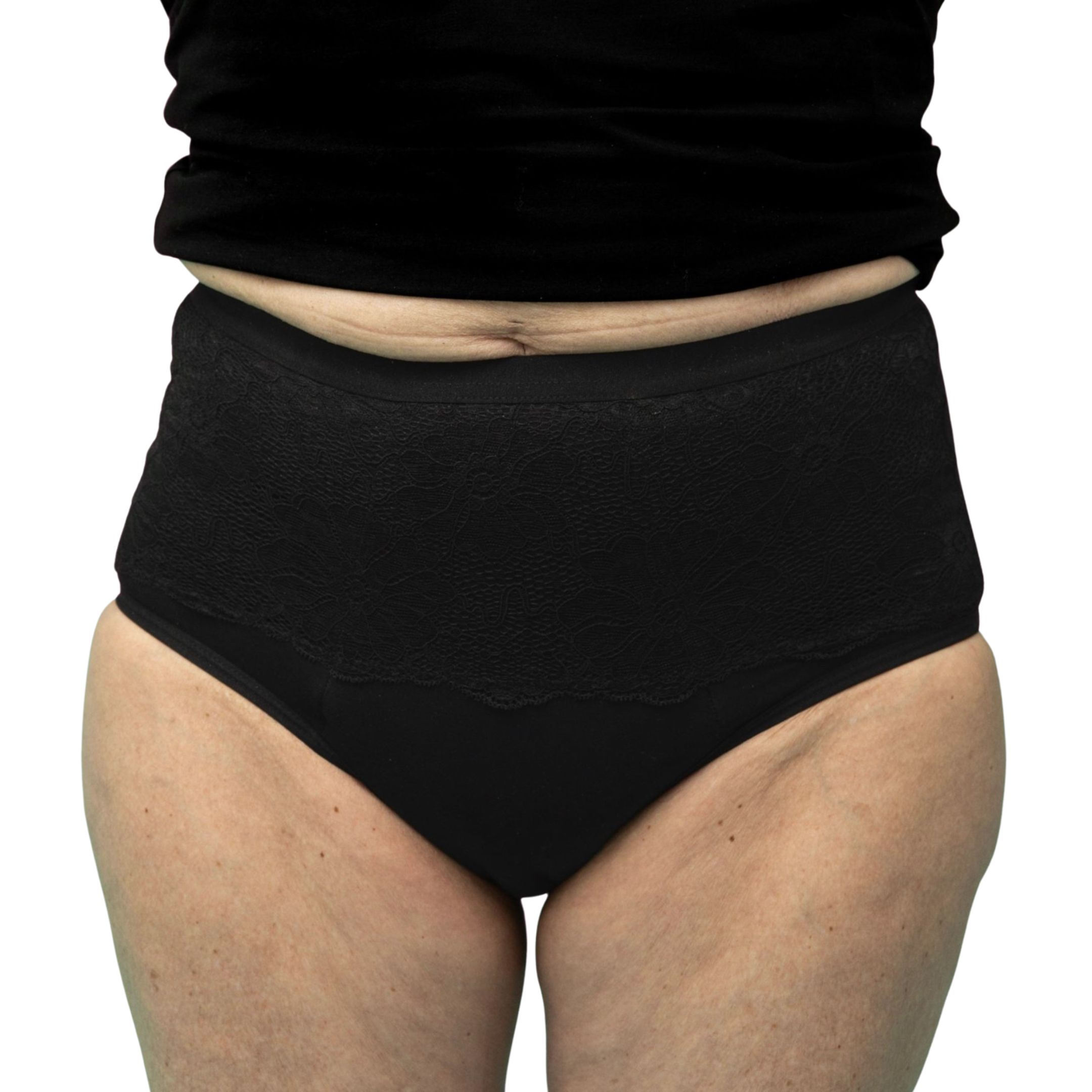 Nahaufnahme einer Frau, die einen schwarzen Inkontinenzslip trägt. Hoher Bund, bedeckt den Bauch.