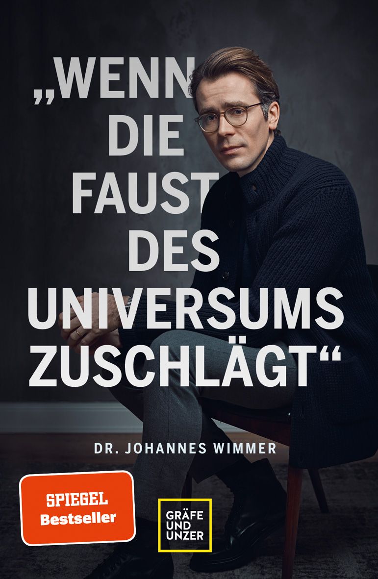 Buchcover mit dem Titel „Wenn die Faust des Universums zuschlägt“. Autor: Dr. Johannes Wimmer. Spiegel Bestseller.