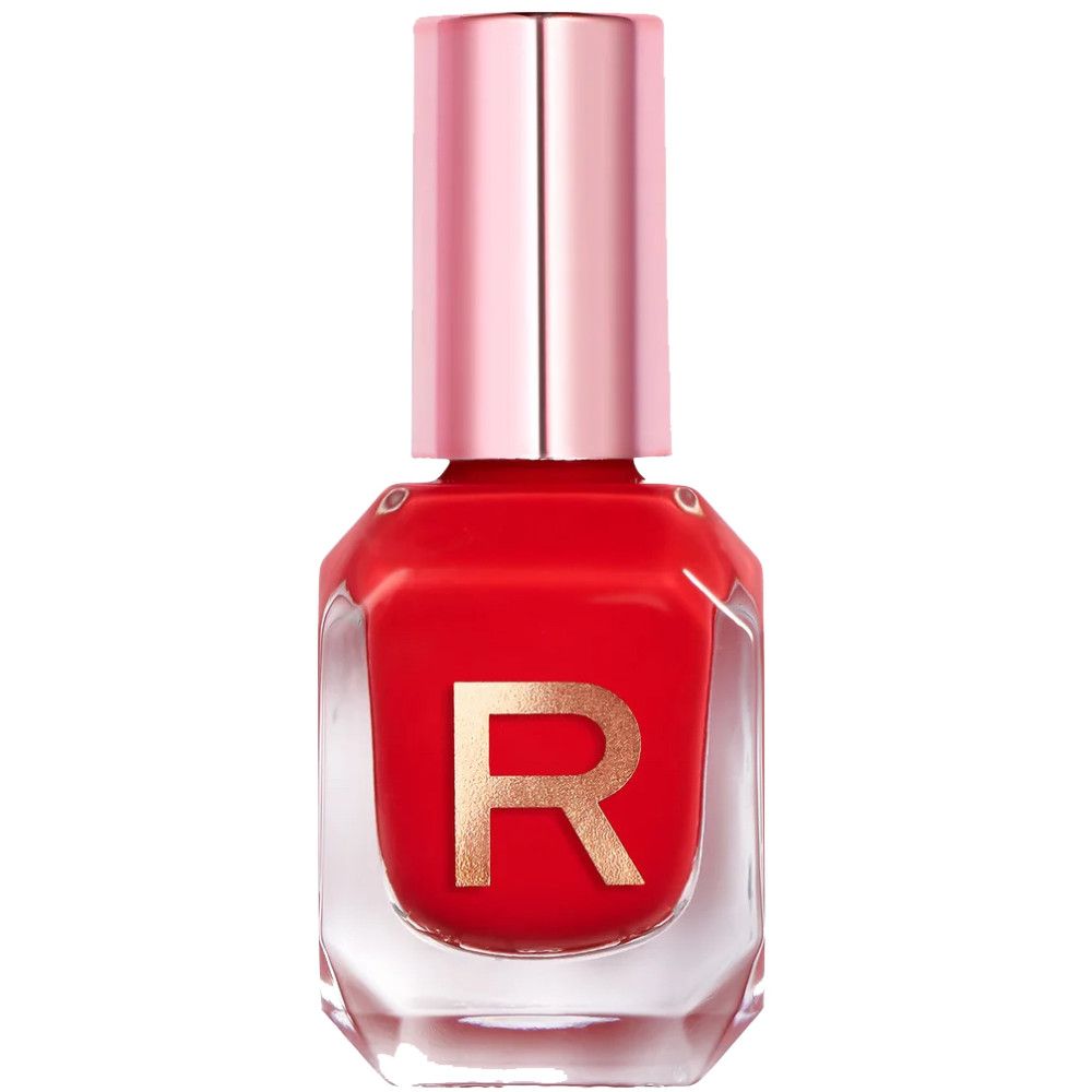 Roter Nagellackflakon mit rosafarbenem Deckel. Goldfarbenes "R" auf der Vorderseite. Klarer, achteckiger Flakon.