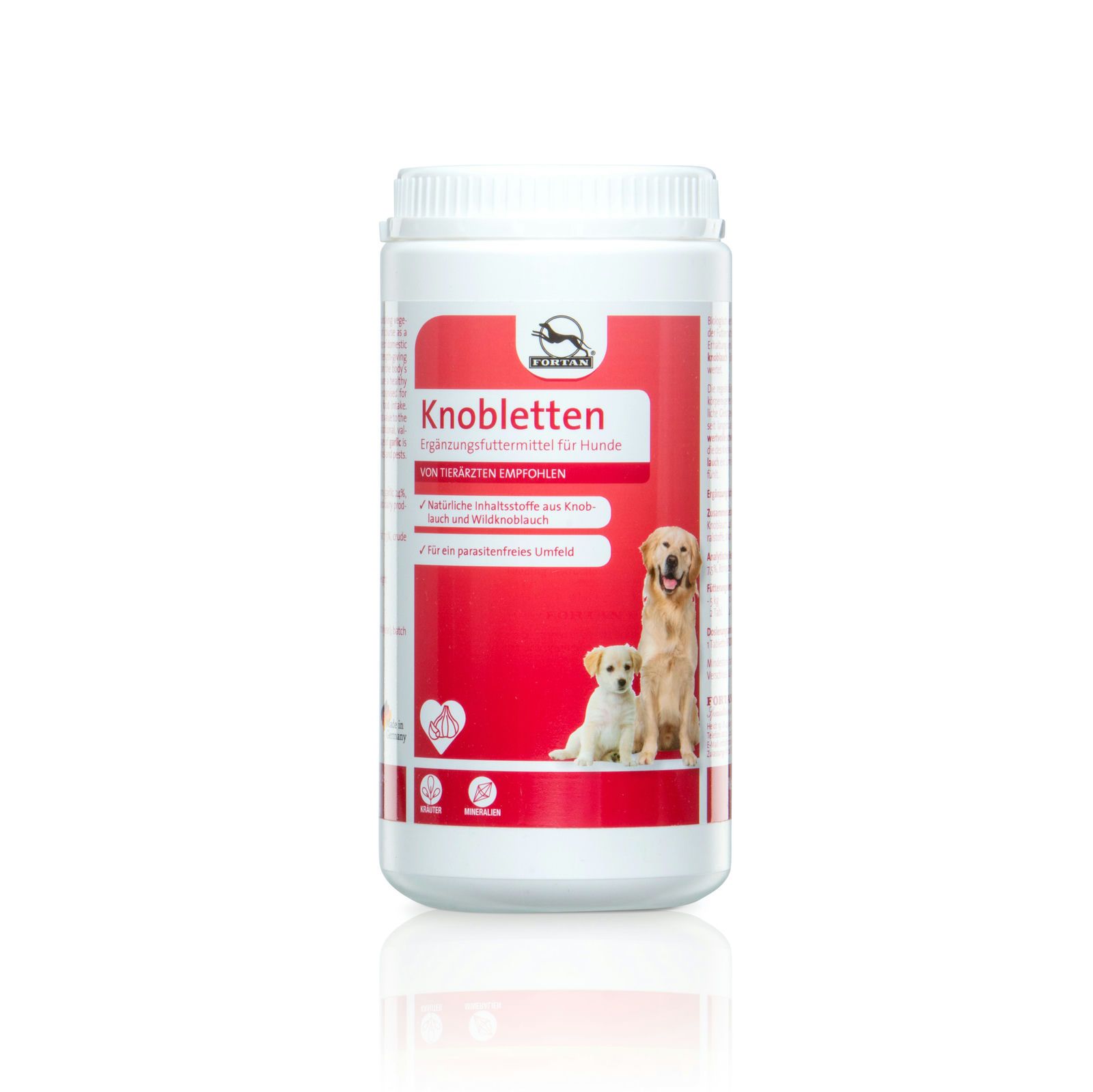 Weiße Dose mit rotem Etikett. Text: Knobletten, Ergänzungsfuttermittel für Hunde. Abbildung: zwei Hunde. Logo.