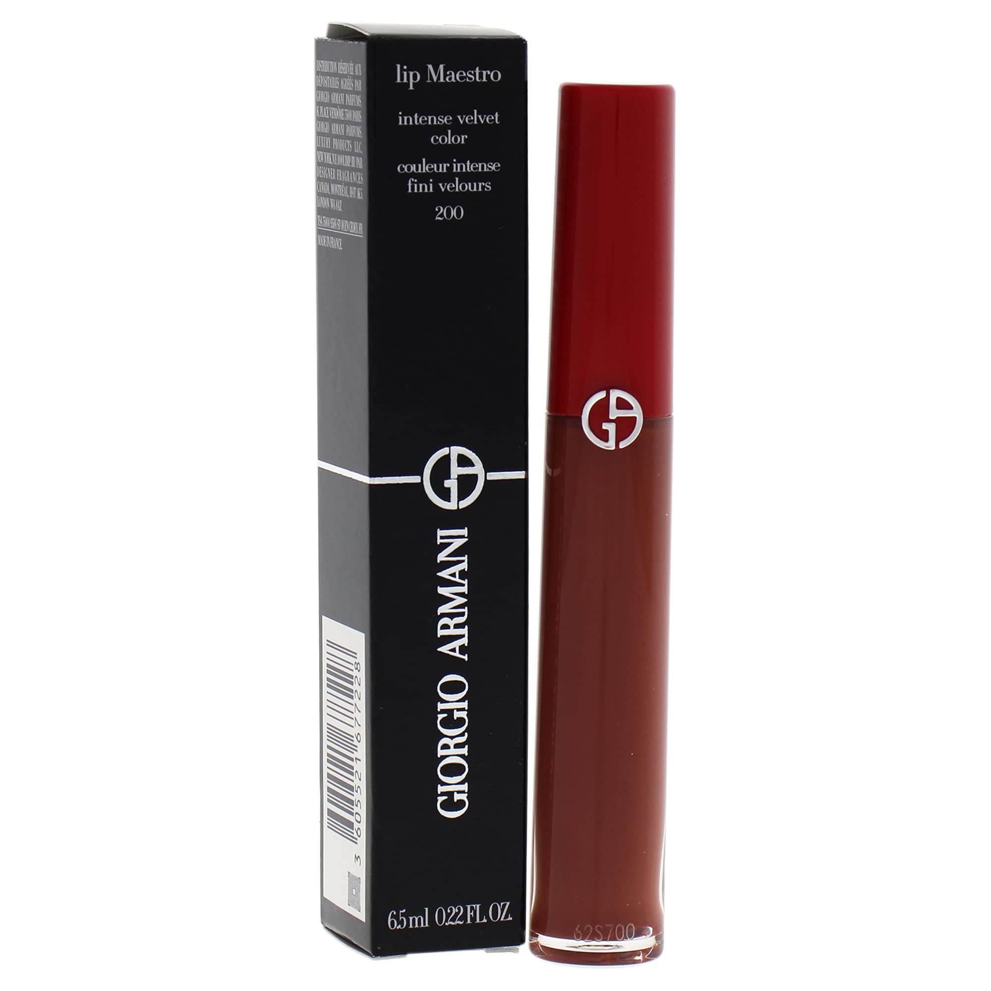 Lippenstift und Verpackung. Schwarze Verpackung mit Giorgio Armani Logo und Produktbezeichnung. Brauner Lippenstift.