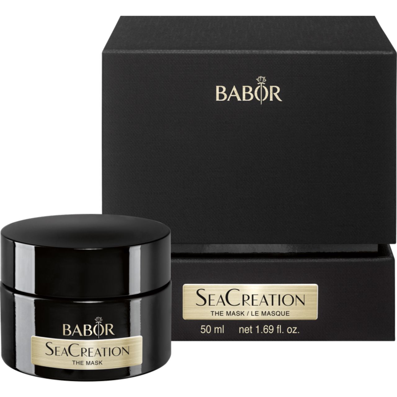 Schwarzer Tiegel und Box. Tiegel mit "BABOR SeaCreation THE MASK". Box mit Logo und Volumenangabe.