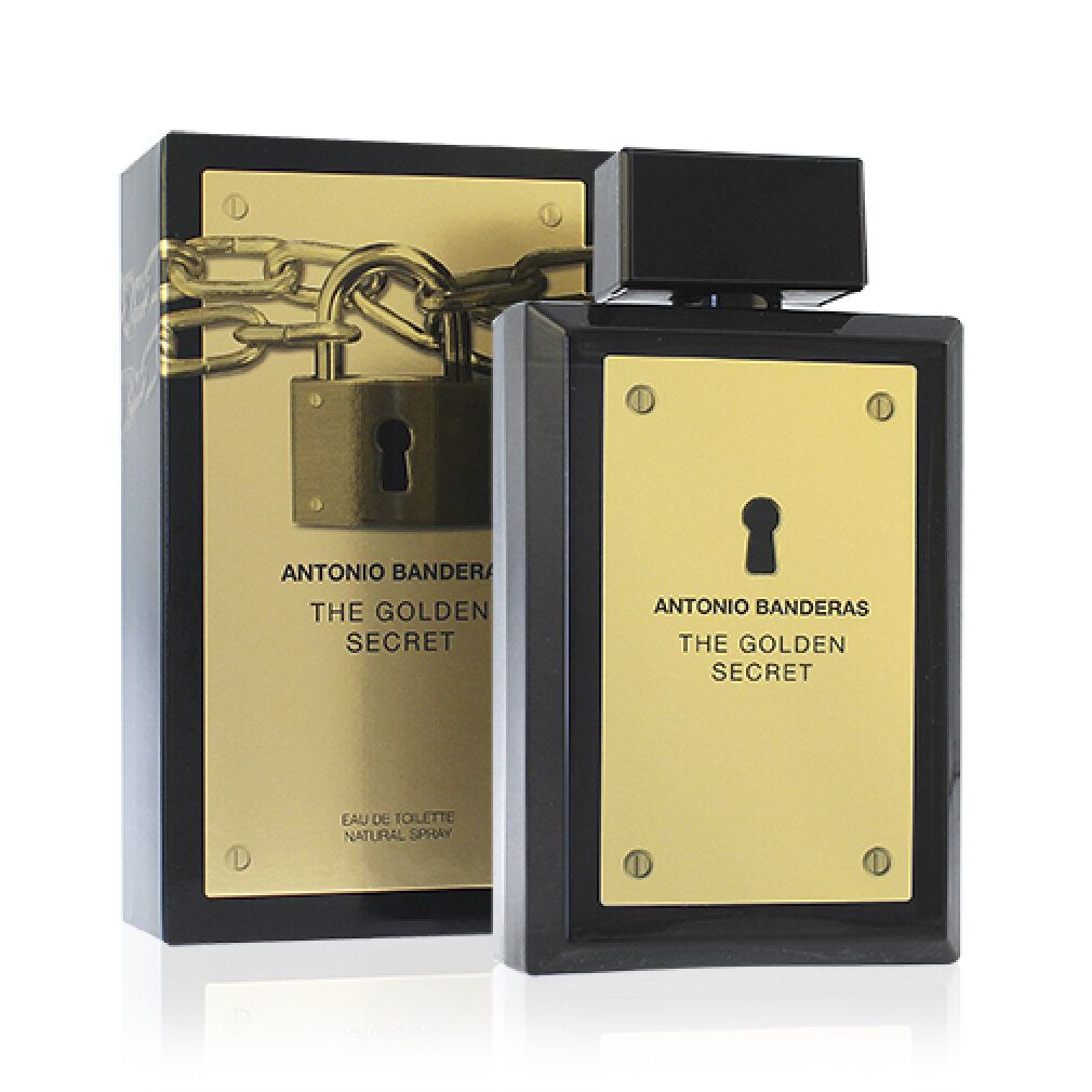 Flakon und Verpackung. Schwarzer Flakon mit goldener Platte. Goldene Verpackung mit Kette und Schloss.