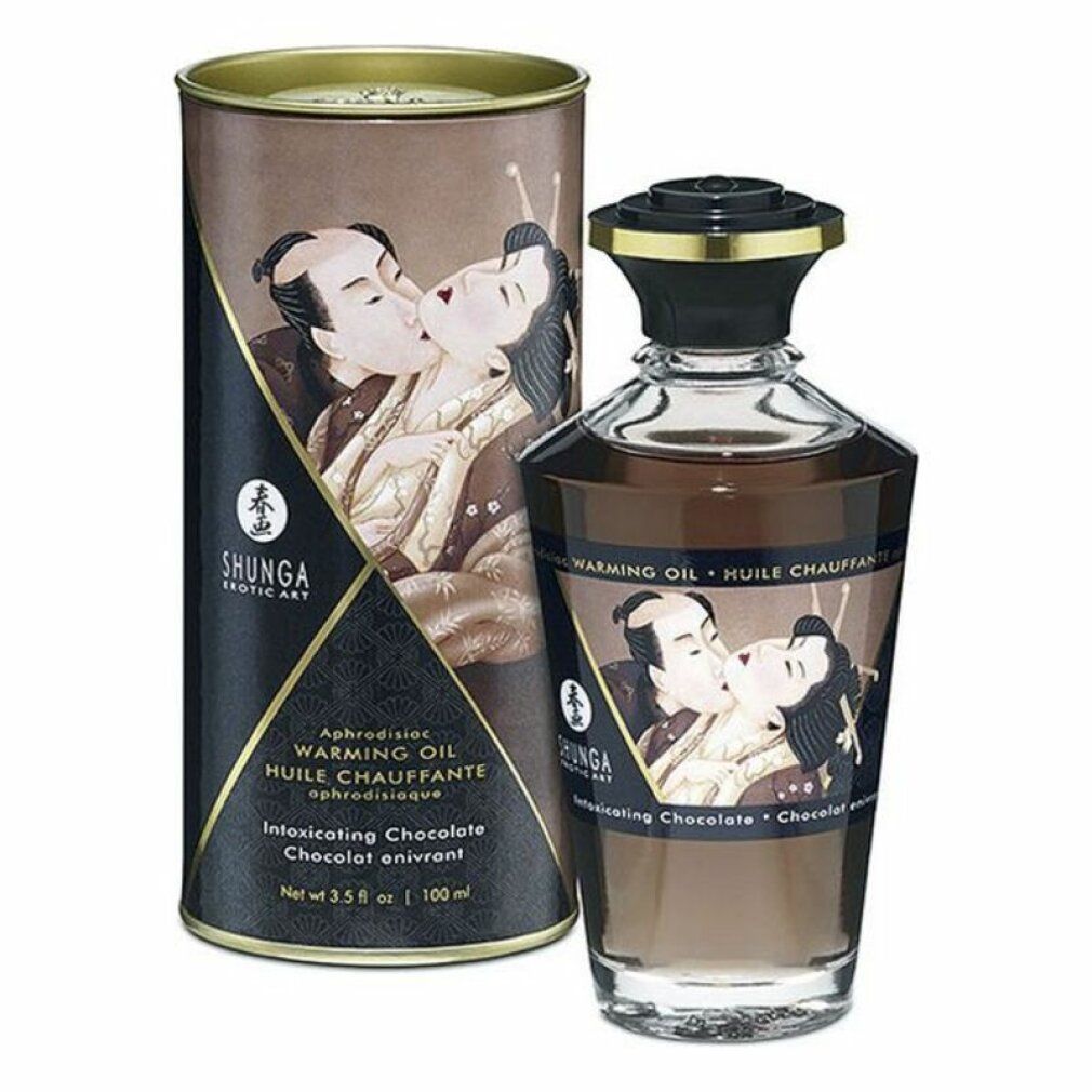 Bruine fles en doos met etiketten. Opschrift: Shunga, Warming Oil, Intoxicating Chocolate. Illustratie: kussend paar.
