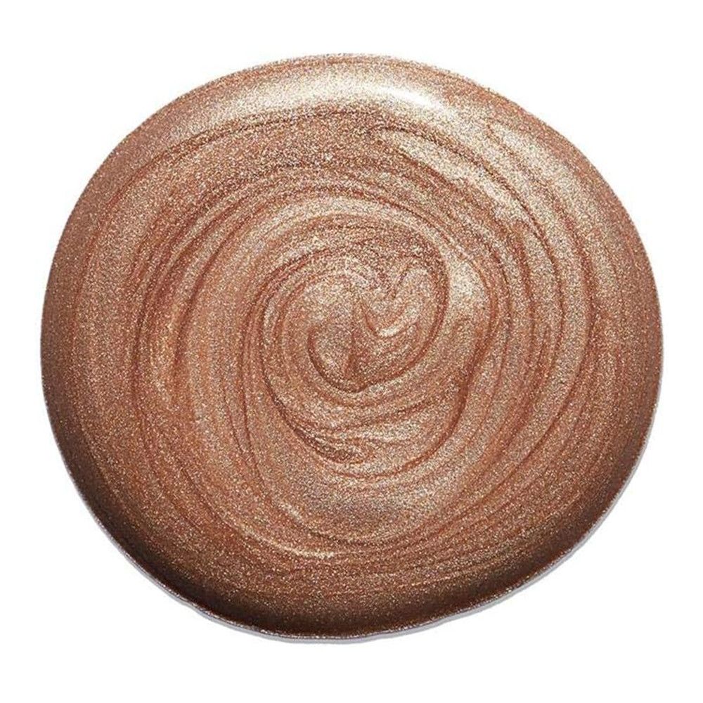 Kreisförmiger Highlighter-Swirl in Goldtönen. Die Textur ist cremig und glänzend. Der Hintergrund ist weiß.