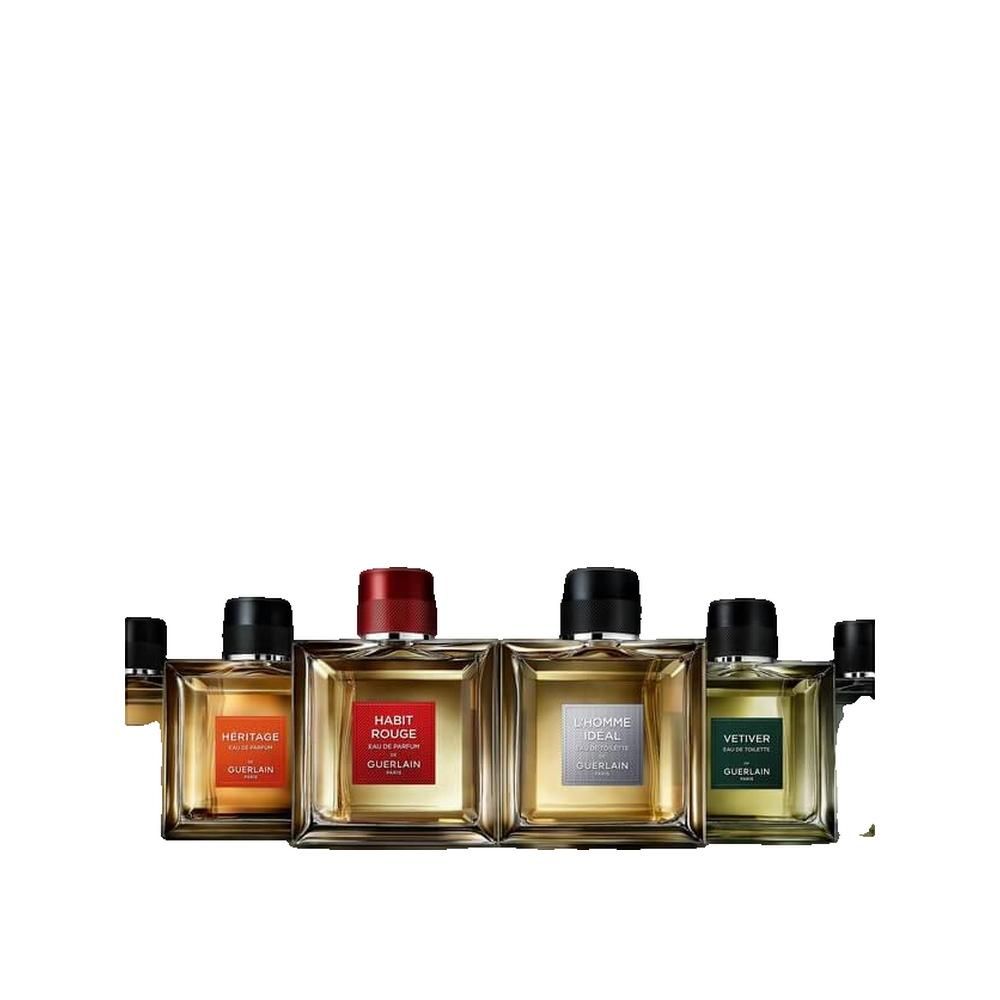 Vier Flakons nebeneinander. Héritage, Habit Rouge, L'Homme Idéal, Vétiver. Alle quadratisch, mit schwarzem oder rotem Deckel.