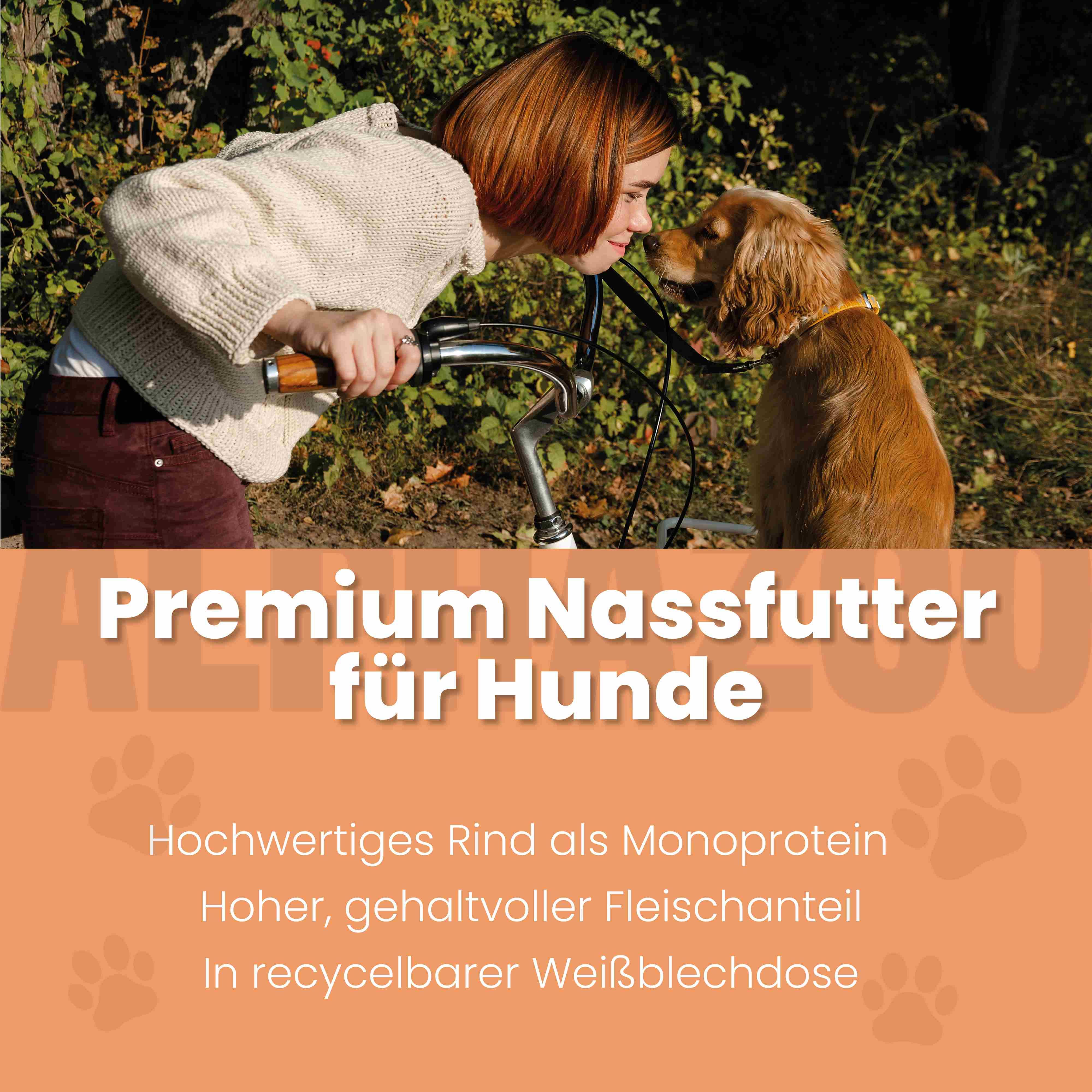 Person und Hund an Fahrrad. Text: Premium Nassfutter für Hunde. Hochwertiges Rind als Monoprotein.