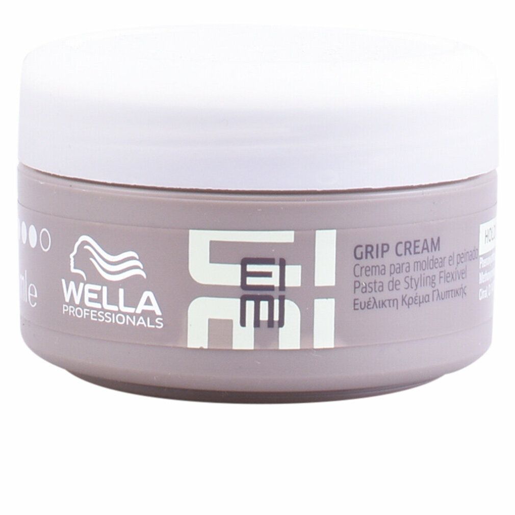 Behälter mit weißem Deckel. Aufschrift: Wella Eimi Grip Cream. Mehrsprachige Produktbezeichnungen.