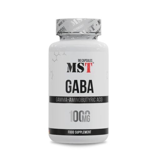 Weiße Flasche mit rotem und schwarzem Aufdruck. Beschriftung: MST GABA, 90 Kapseln, 1000mg. Aufkleber: Made in Germany.