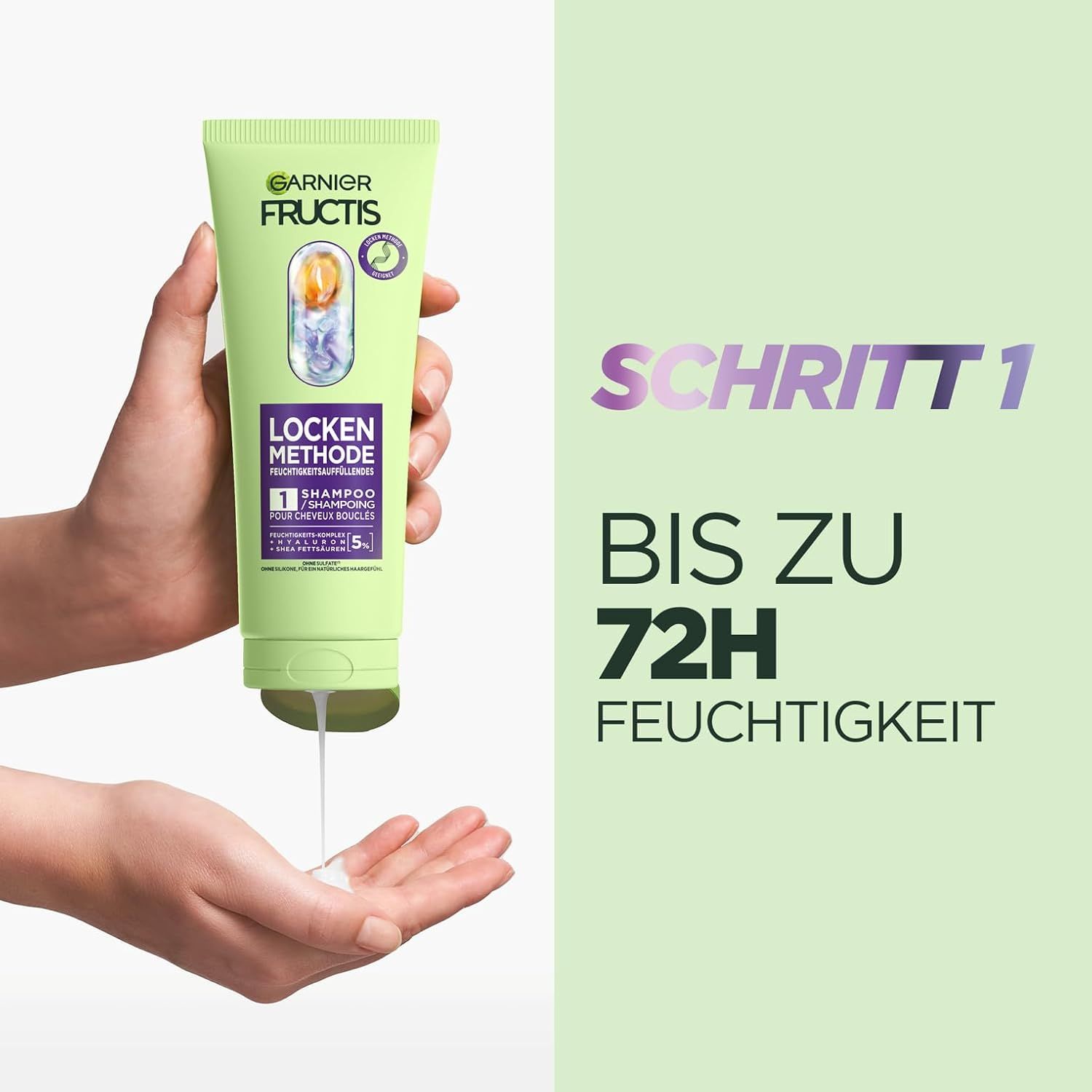 Hand hält grüne Tube Garnier Fructis Locken Methode Shampoo. Produkt wird aus der Tube gedrückt.