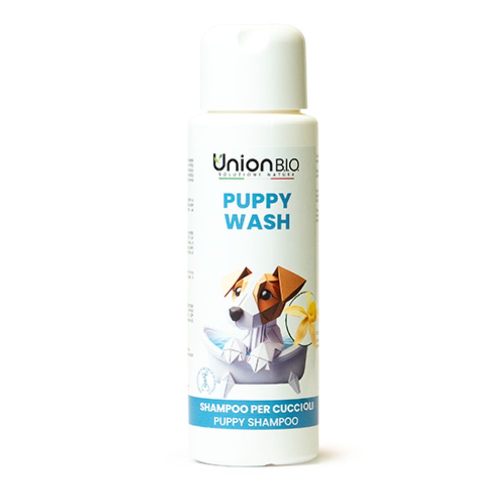 Weiße Flasche mit Klappverschluss. Aufschrift "Union BIO Puppy Wash". Abbildung eines Hundes. Text: Shampoo per cuccioli, Puppy Shampoo.