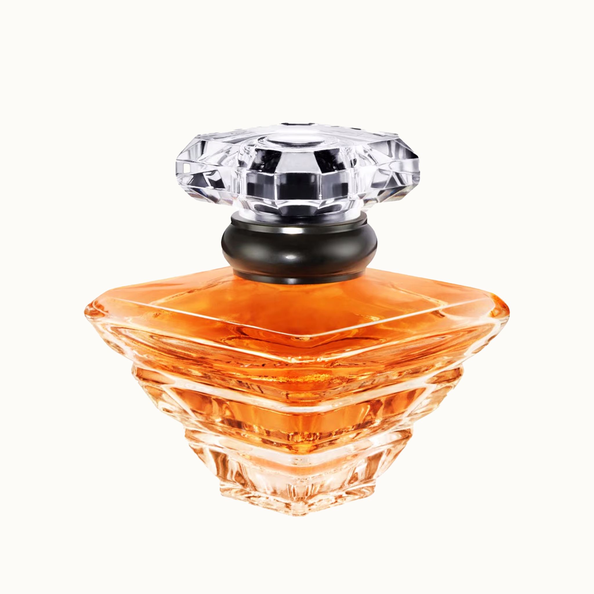 Trésor E.d.P. Vapo Flakon. Quadratischer Flakon mit orangefarbener Flüssigkeit. Klarer Deckel. Lancôme-Logo.