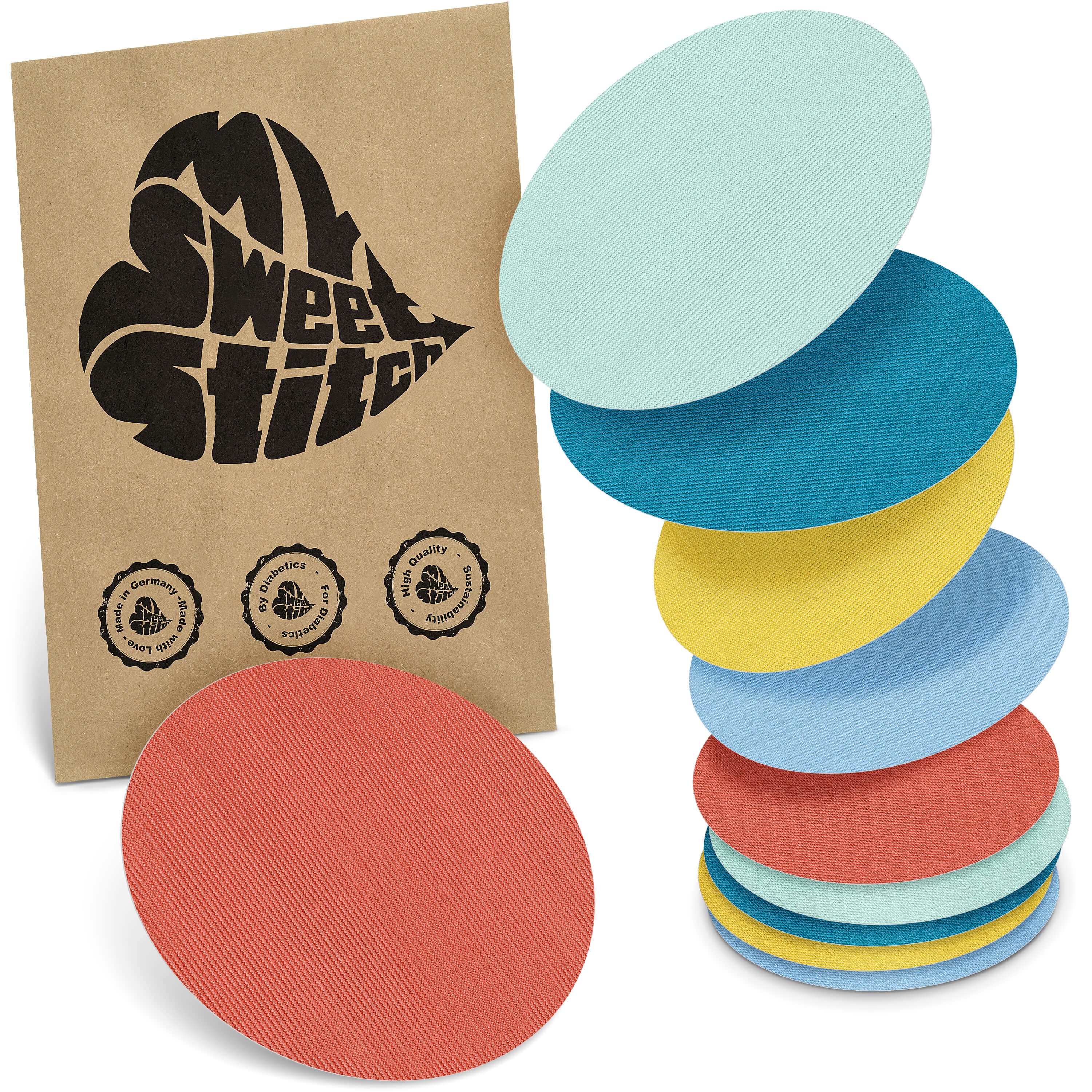 Mehrfarbige, ovale Pflaster. Braune Papiertüte mit Logo. Aufschrift: My Sweet Stitch. Siegel: Made in Germany, by Excellence, High Quality.