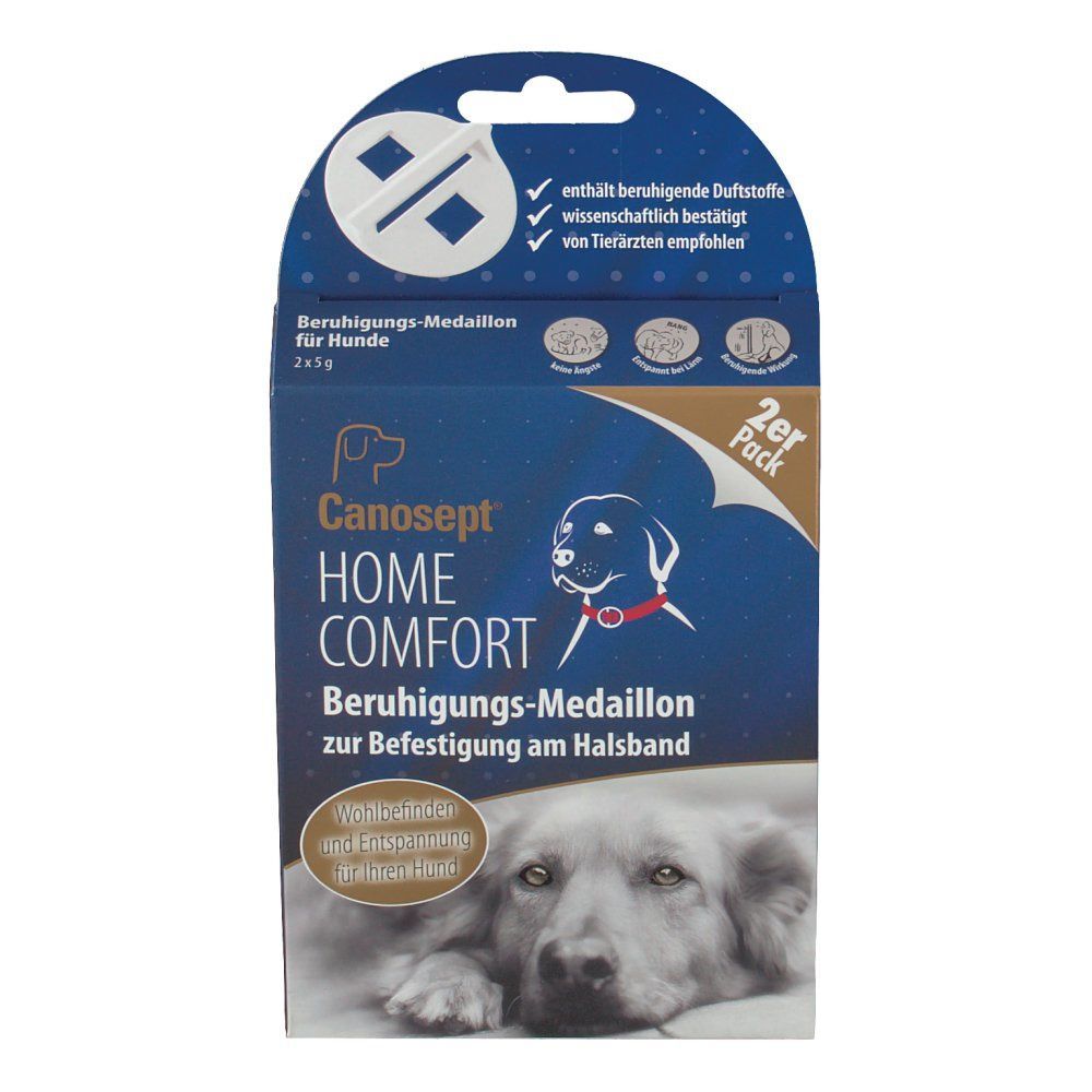 Blaue Produktverpackung mit Canosept HOME COMFORT-Logo. Text: Beruhigungs-Medaillon für Hunde. 2er Pack. Hundefoto.