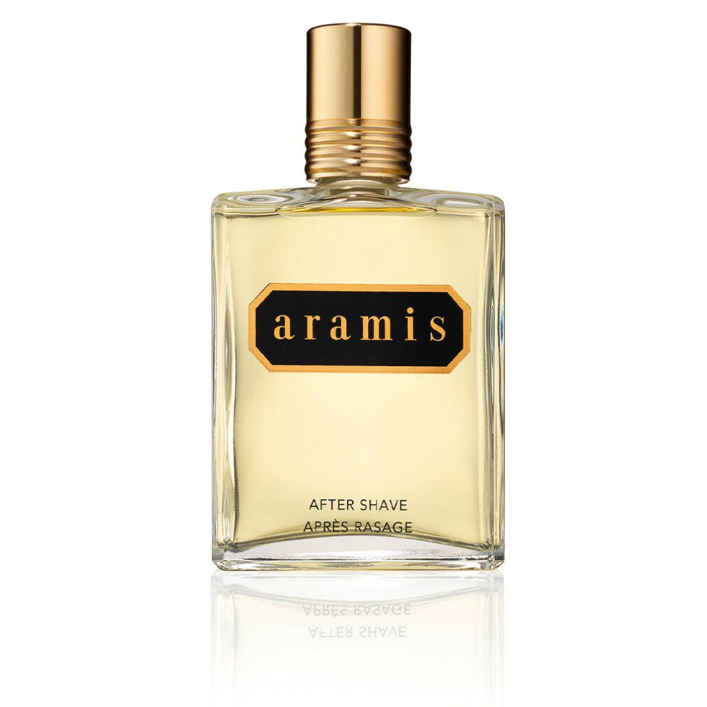 Aramis After Shave Flakon. Rechteckige Glasflasche mit goldfarbenem Verschluss. Schwarzes Etikett mit goldfarbenem Schriftzug.