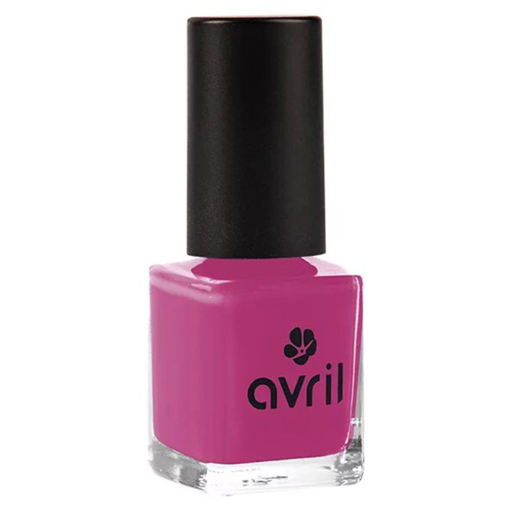 Nagellackflasche mit schwarzem Deckel. Der Lack ist pink. Auf der Flasche steht "avril".