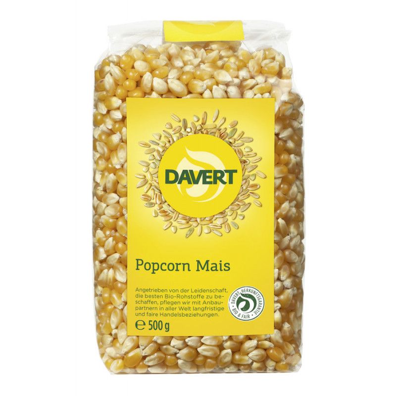 Klare Plastiktüte mit Popcorn Mais. Gelbes Etikett mit "DAVERT" Logo und "Popcorn Mais". Bio-Siegel und Gewichtsangabe.