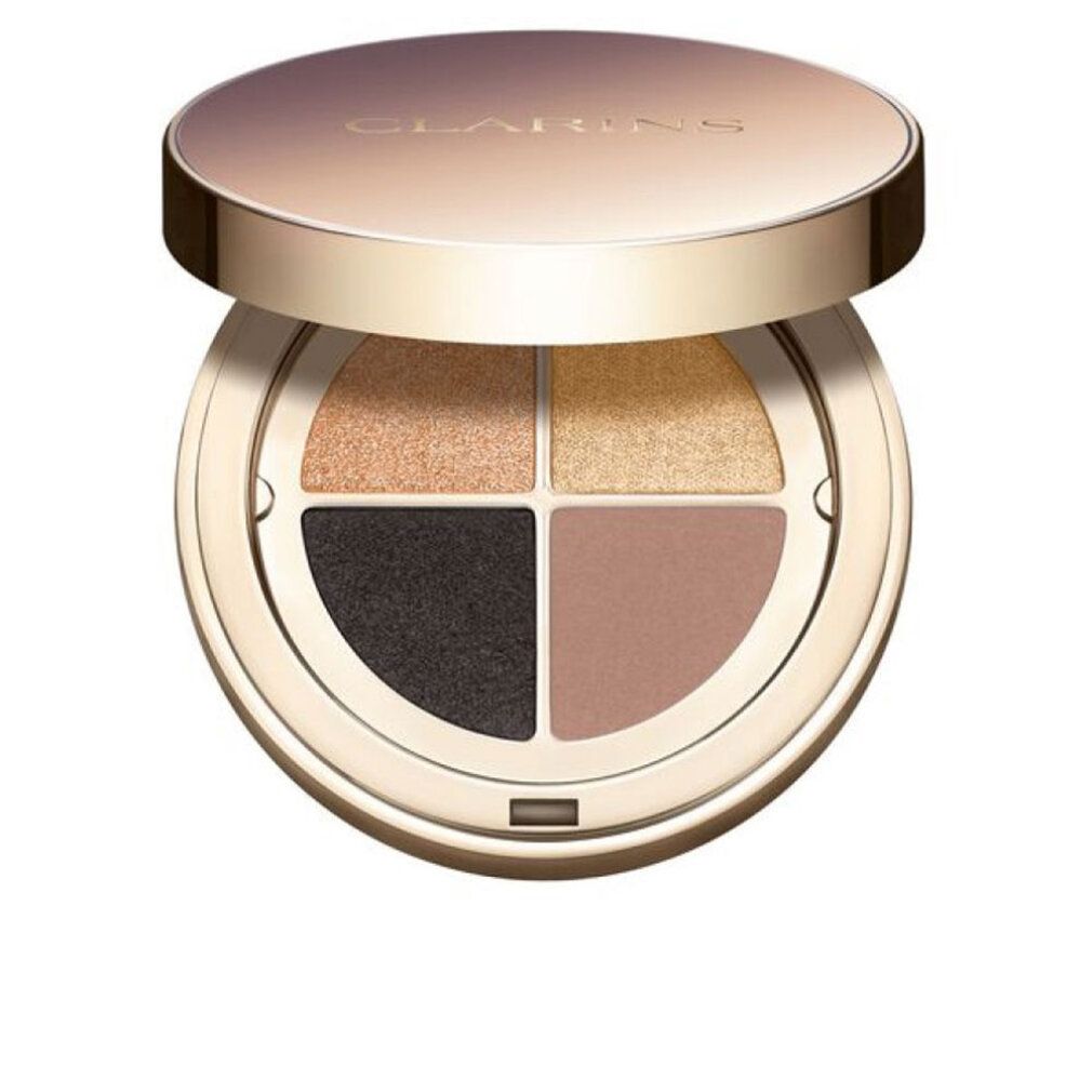 Runde, goldfarbene Lidschatten-Palette mit vier Farben. Deckel geöffnet. Marke Clarins sichtbar.