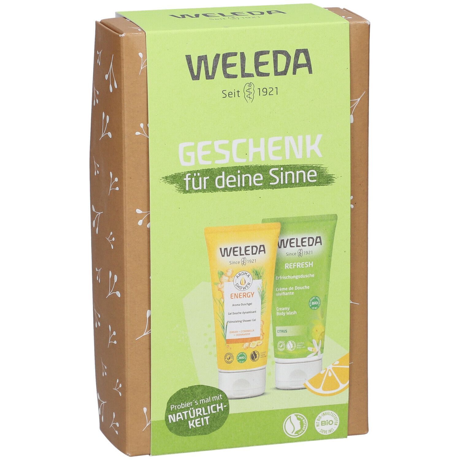 Weleda Geschenkset. Karton mit zwei Tuben: Energy und Refresh. Aufschrift: Geschenk für deine Sinne. Bio-Zertifizierung.