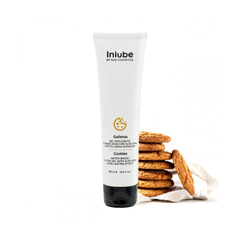 Weißes Tube mit schwarzem Verschluss. Aufschrift: Inlube by NUEI Cosmetics. Text: Cookies, Gleitgel. Daneben Kekse.