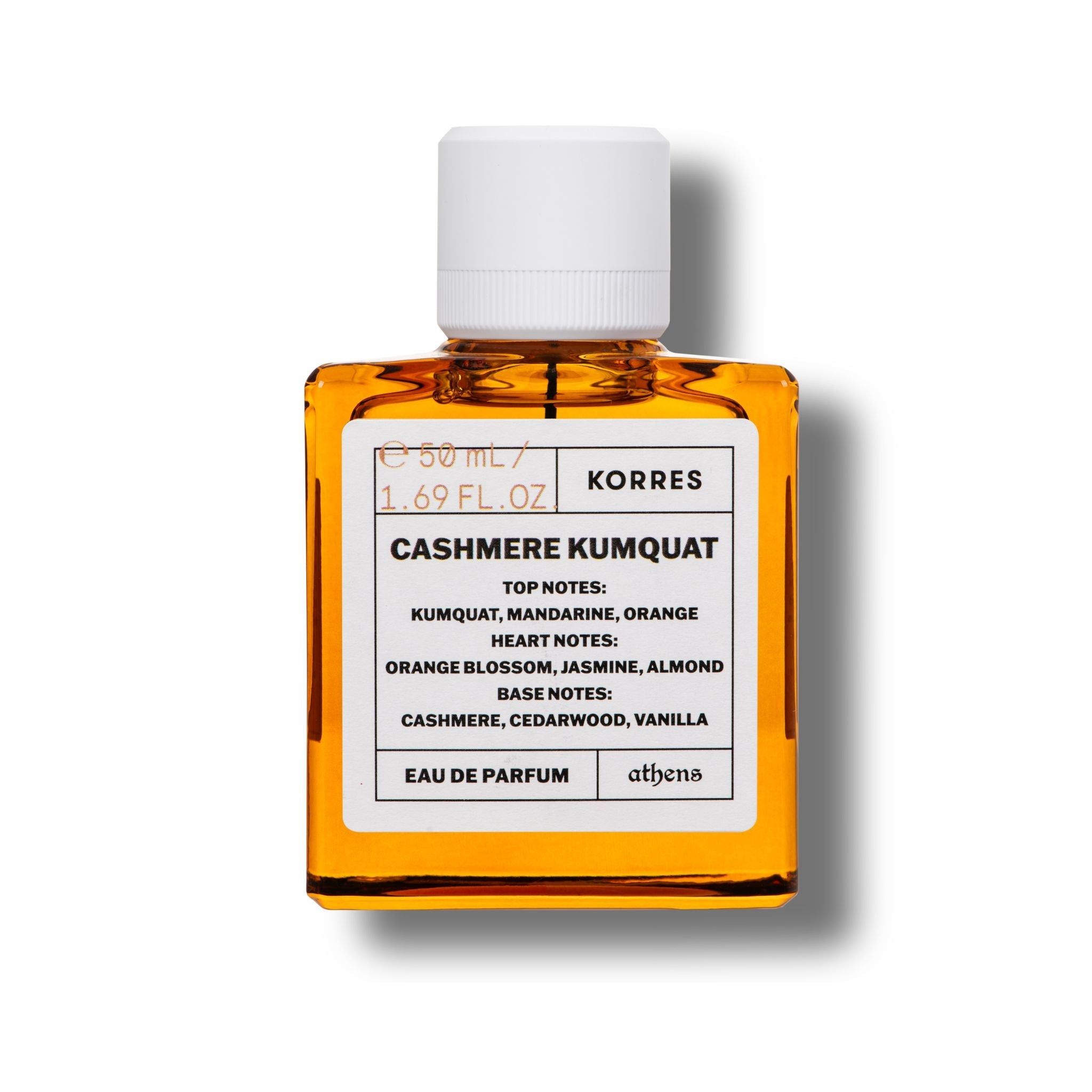Parfümflakon mit weißem Deckel und gelbem Etikett. Auf dem Etikett stehen "KORRES", "CASHMERE KUMQUAT" und Duftnoten.