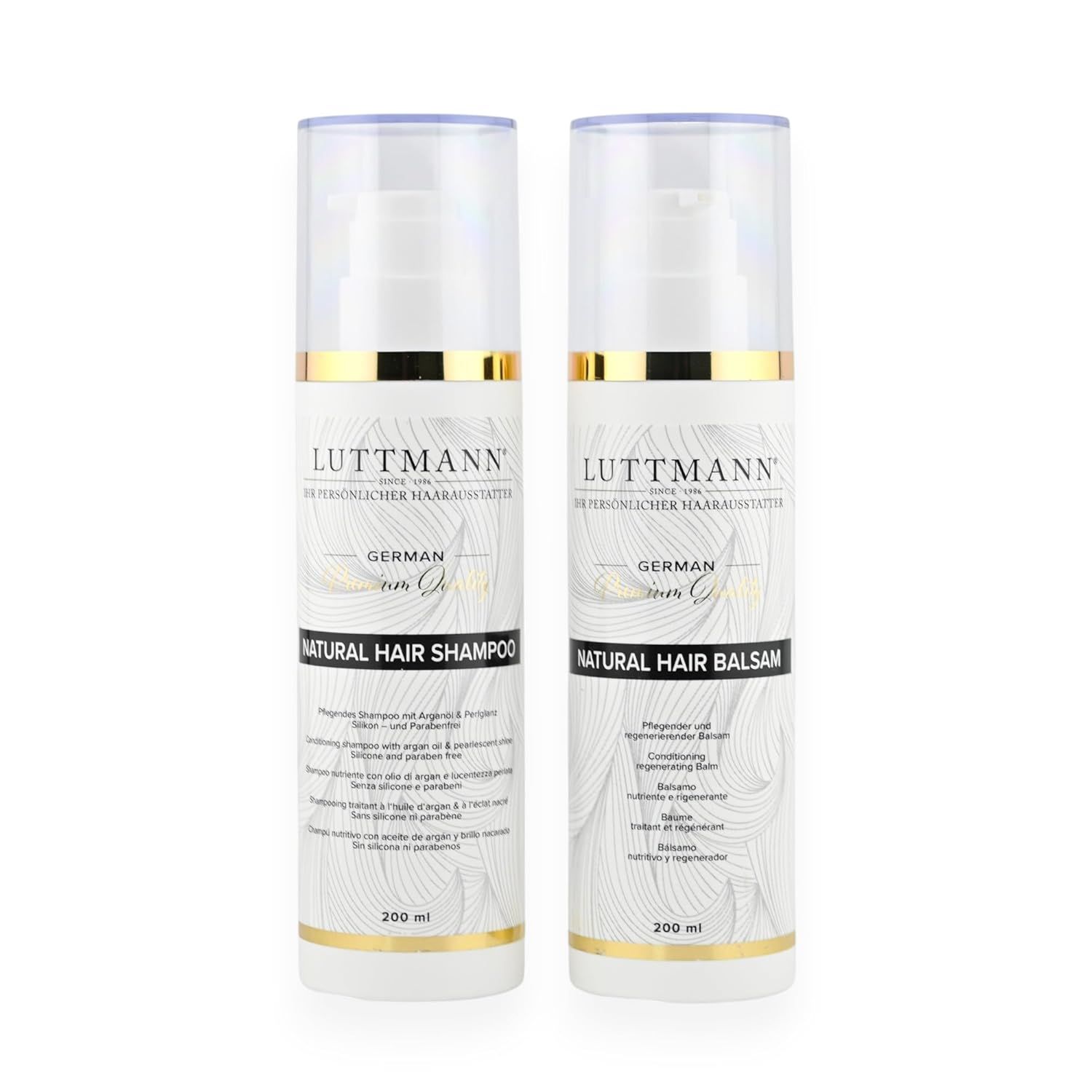 Zwei Flaschen LUTTMANN® Shampoo und Balsam. Weiß, goldfarbene Akzente, Pumpverschluss. Beschriftung: Natural Hair Shampoo/Balsam.