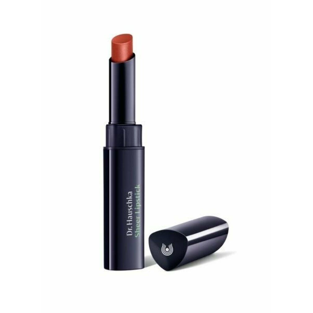 Lippenstift mit geöffneter Kappe. Dunkelblauer Stift mit Schriftzug. Lippenstift in Aprikot-Farbe.