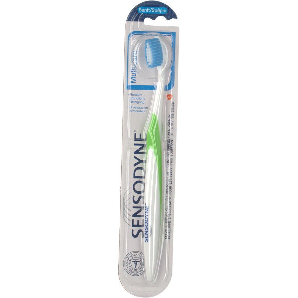 Zahnbürste in Blisterverpackung. Weißer Griff mit grünem Einsatz, blauer Bürstenkopf. Marke: Sensodyne.