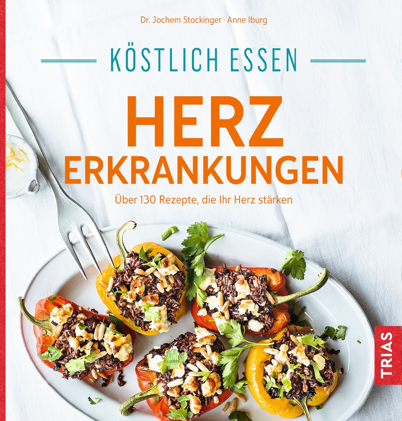 Buchcover mit Titel „Köstlich essen Herzerkrankungen“. Gefüllte Paprika auf Teller. Autorennamen und Verlagshinweis.