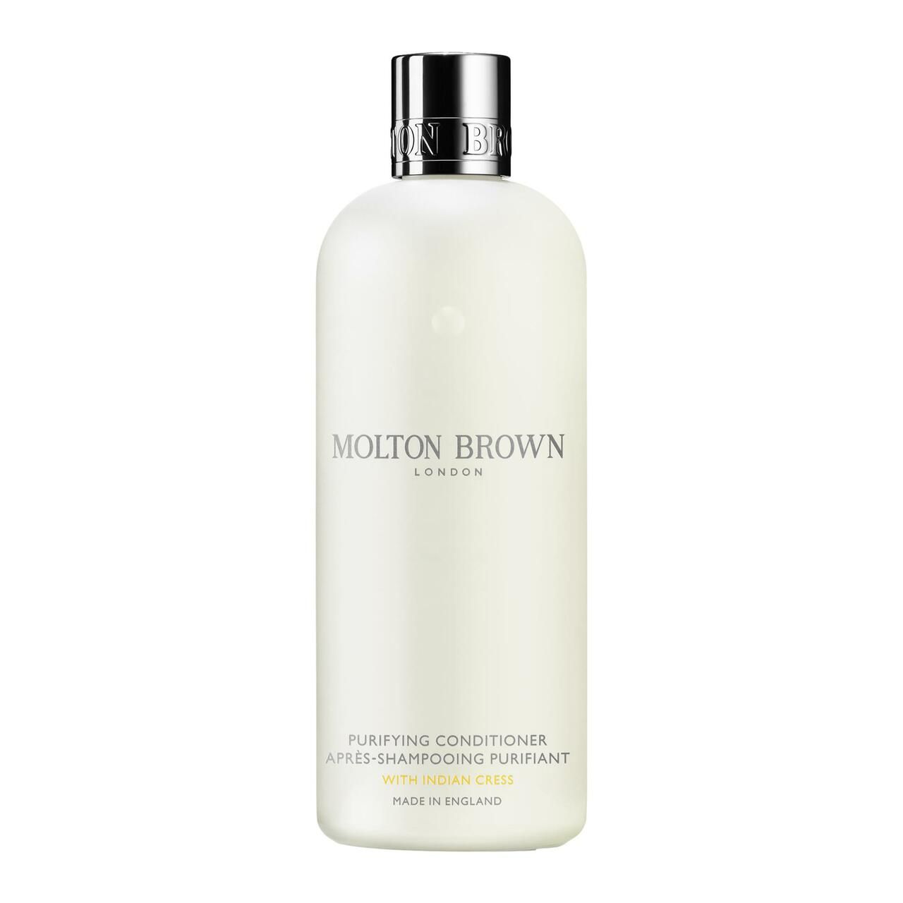 Flasche mit silbernem Deckel. Aufschrift: Molton Brown London, Purifying Conditioner, mit Kapuzinerkresse. Hergestellt in England.