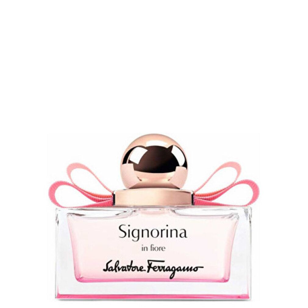 Parfümflakon mit rosa Flüssigkeit, rosa Schleife und goldfarbenem Verschluss. Aufschrift: Signorina in Fiore, Salvatore Ferragamo.