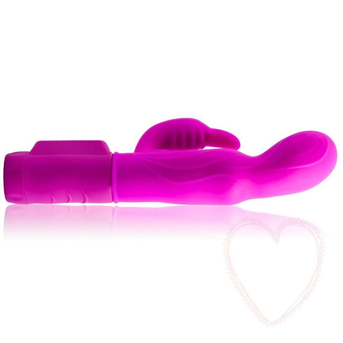 Lila Vibrator, liegend. Kaninchenohren-Design. Bedienfeld sichtbar. Aus Silikon.