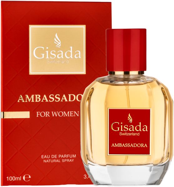 Flakon und rote Verpackung. Flakon mit rotem Verschluss und Etikett "Gisada Ambassadora". Verpackung mit goldener Schrift.