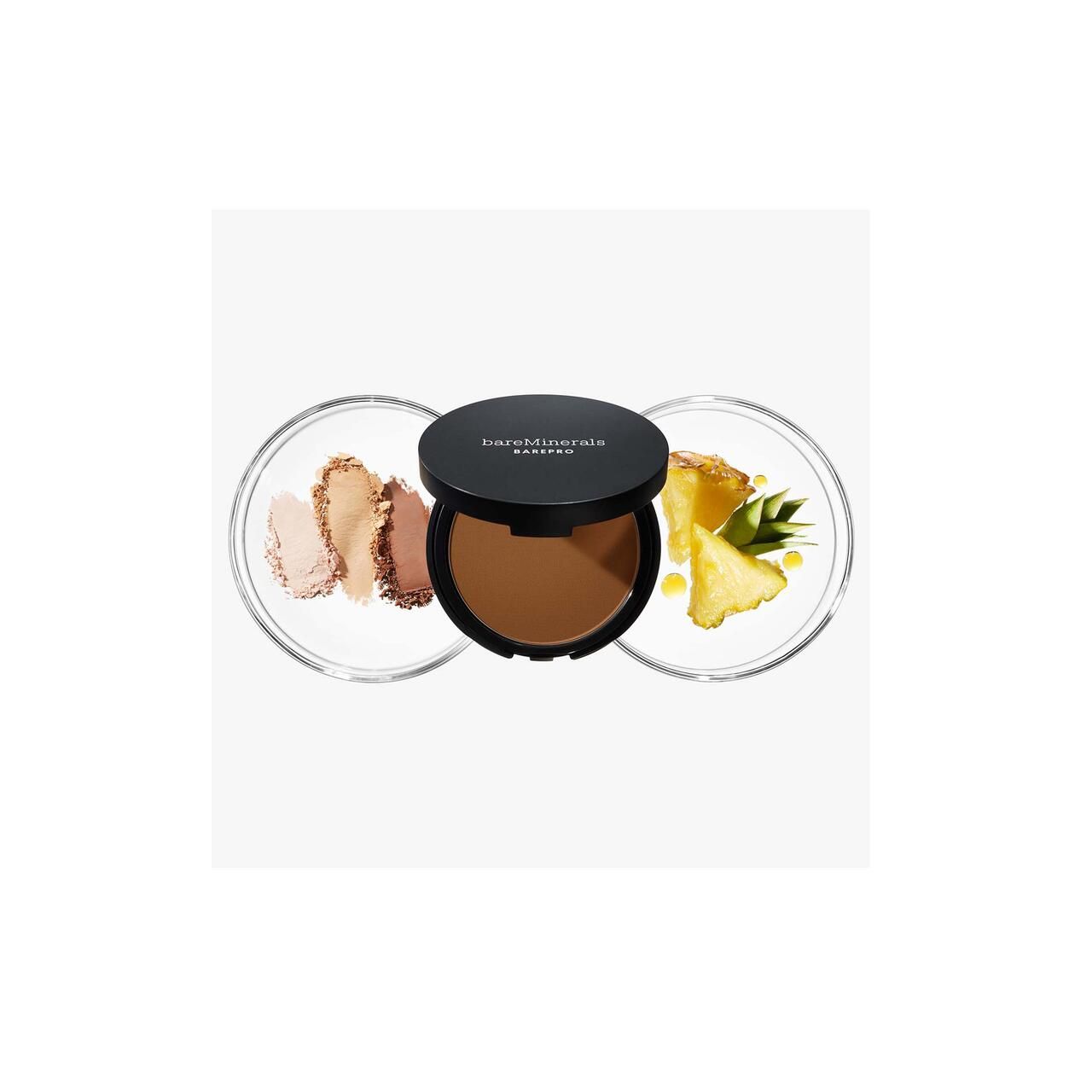 Kompaktpuder mit Deckel. Gehäuse und Puder in mittlerem Braunton. Auf transparenten Tellern mit Ananas.