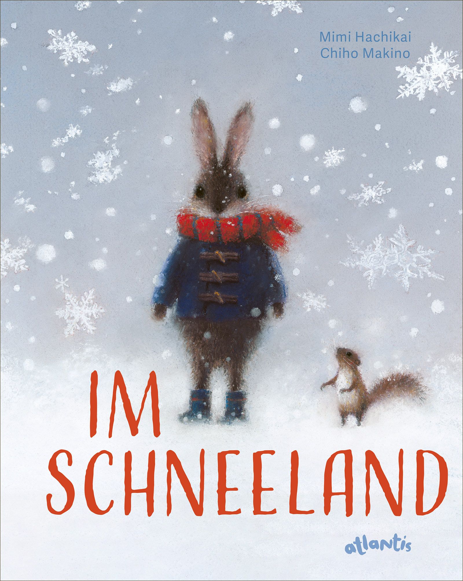 Buchcover mit Illustration eines Hasen in Winterkleidung und Eichhörnchen. Titel: Im Schneeland. Autoren: Mimi Hachikai, Chiho Makino. Verlag: atlantis.
