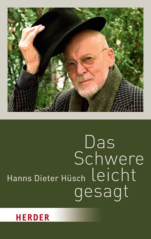 Buchcover mit Porträt eines älteren Mannes mit Brille und Hut. Titel: Das Schwere leicht gesagt, Autor: Hanns Dieter Hüsch, Verlag: Herder.