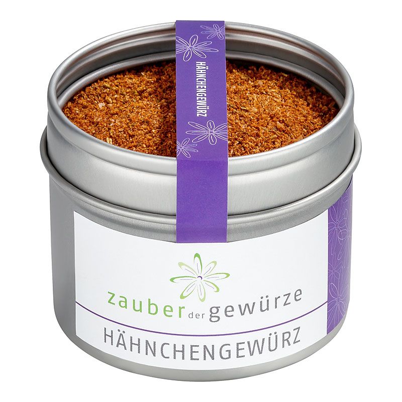 Runde Dose mit Hähnchengewürz. Silberfarbenes Metall, weißes Etikett mit Produktnamen und Logo. Lila Band mit Produktnamen.