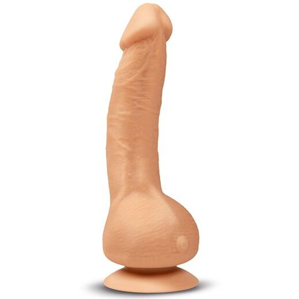 Beigefarbener Dildo mit Saugnapf. Geformt wie ein Penis mit geriffelter Oberfläche.