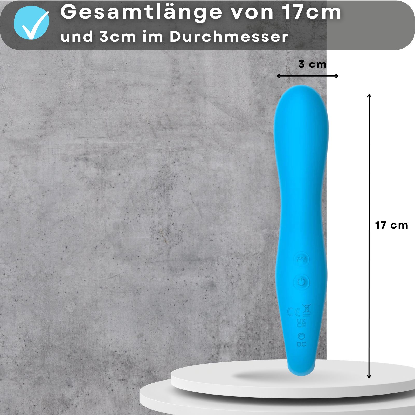 Blauer Vibrator, 17 cm lang, 3 cm Durchmesser. Auf Podest.