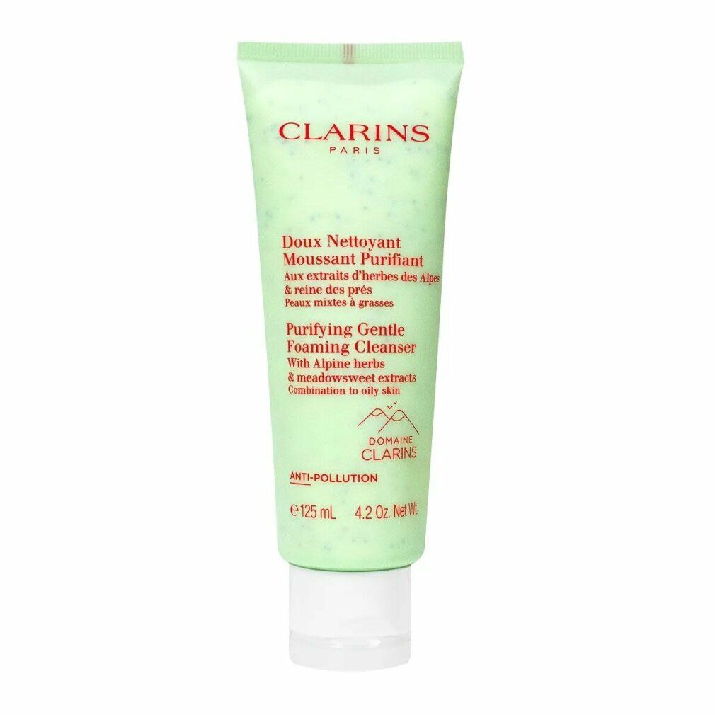 Grüne Tube mit Produkttext. Marke Clarins. Aufschrift: Doux Nettoyant Moussant Purifiant. Mit Alpenkräutern und Wiesensüß-Extrakten.