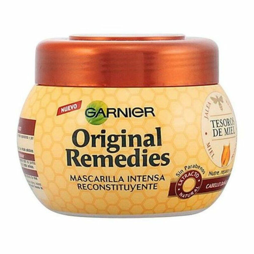Behälter mit Garnier Original Remedies Honig Schätze Maske. Gelb-braune Verpackung mit Schriftzug und Logo.