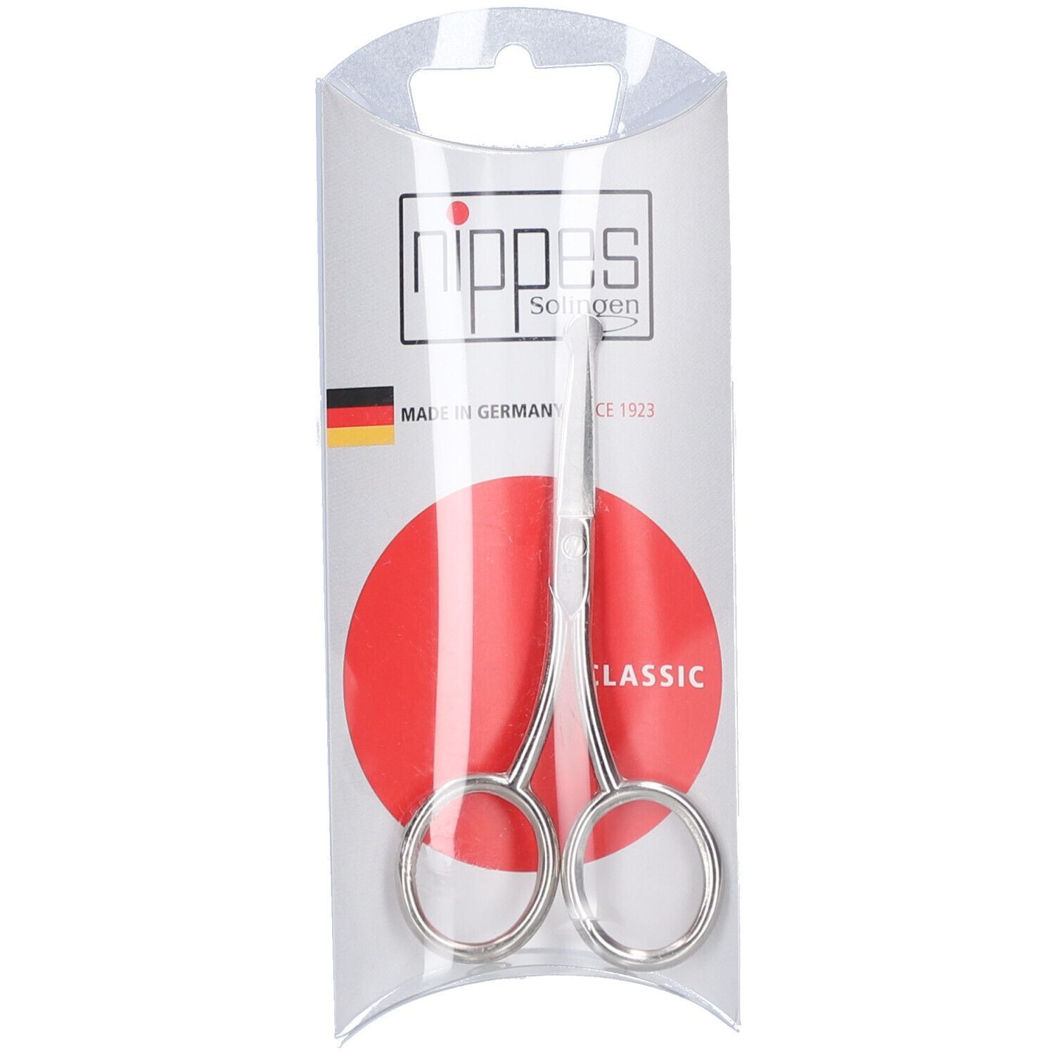 Babyschere in transparenter Verpackung. Metallschere mit abgerundeten Spitzen. Marke: nippes Solingen.