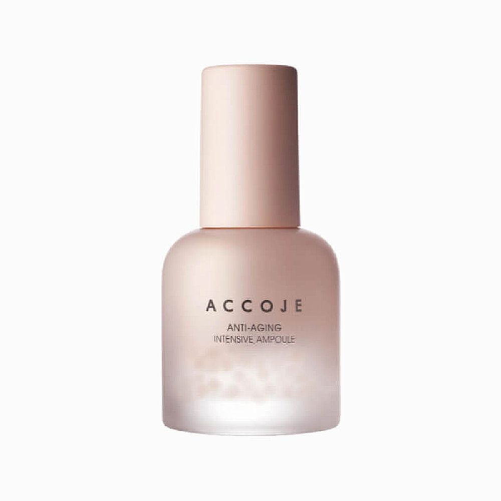 Rosafarbene Flasche mit Deckel. Aufschrift: ACCOJE, Anti-Aging Intensive Ampoule. Unterer Teil milchig-weiß.