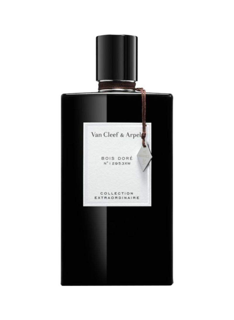 Schwarzer Flakon mit schwarzem Verschluss. Weißes Etikett mit Text: Van Cleef & Arpels, Bois Doré, Collection Extraordinaire. Anhänger.