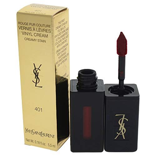 Goldene Verpackung mit Produktname und Logo. Schwarzer Lippenstiftbehälter mit Applikator.