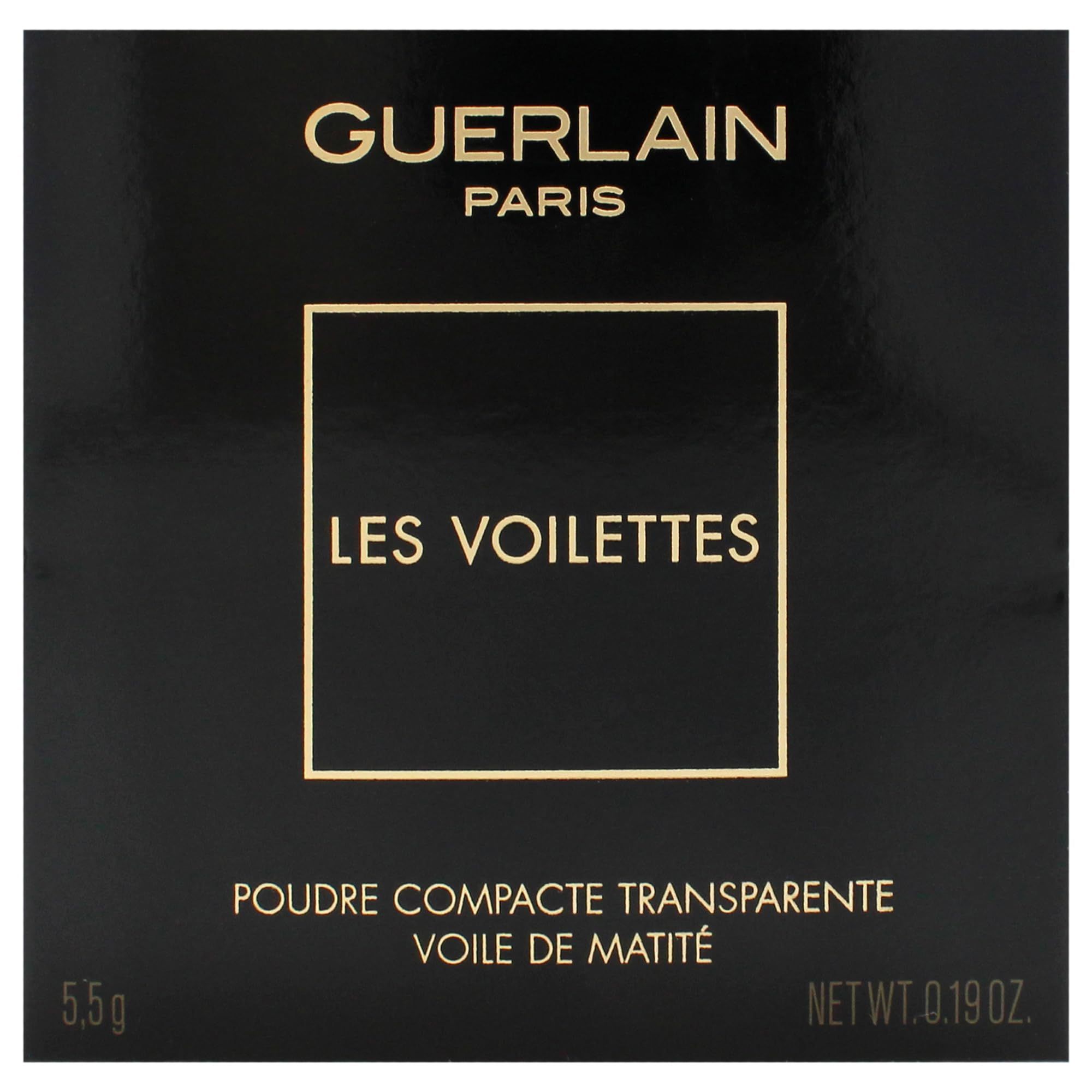 Nahe Ansicht der schwarzen Verpackung. Text: Guerlain, Les Voilettes, Poudre Compacte Transparente, Voile de Matité. Gewicht: 5.5g, 0.19 oz.