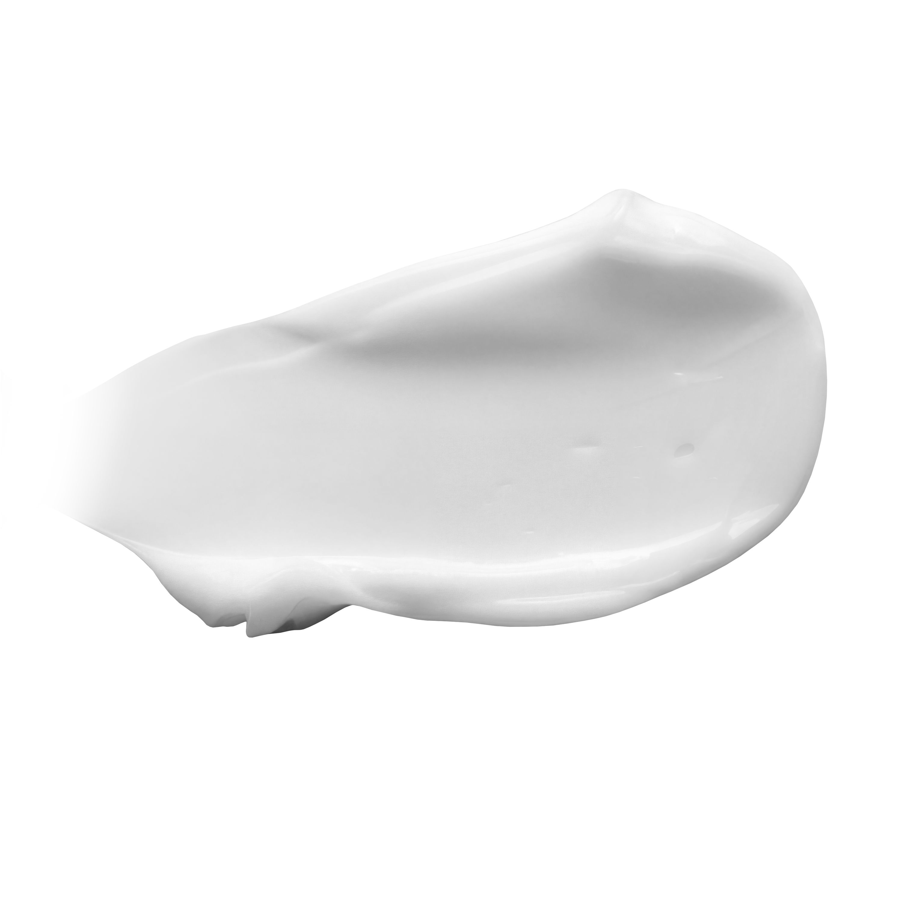 Ein weißer Klecks Baby Lotion auf weißem Hintergrund.