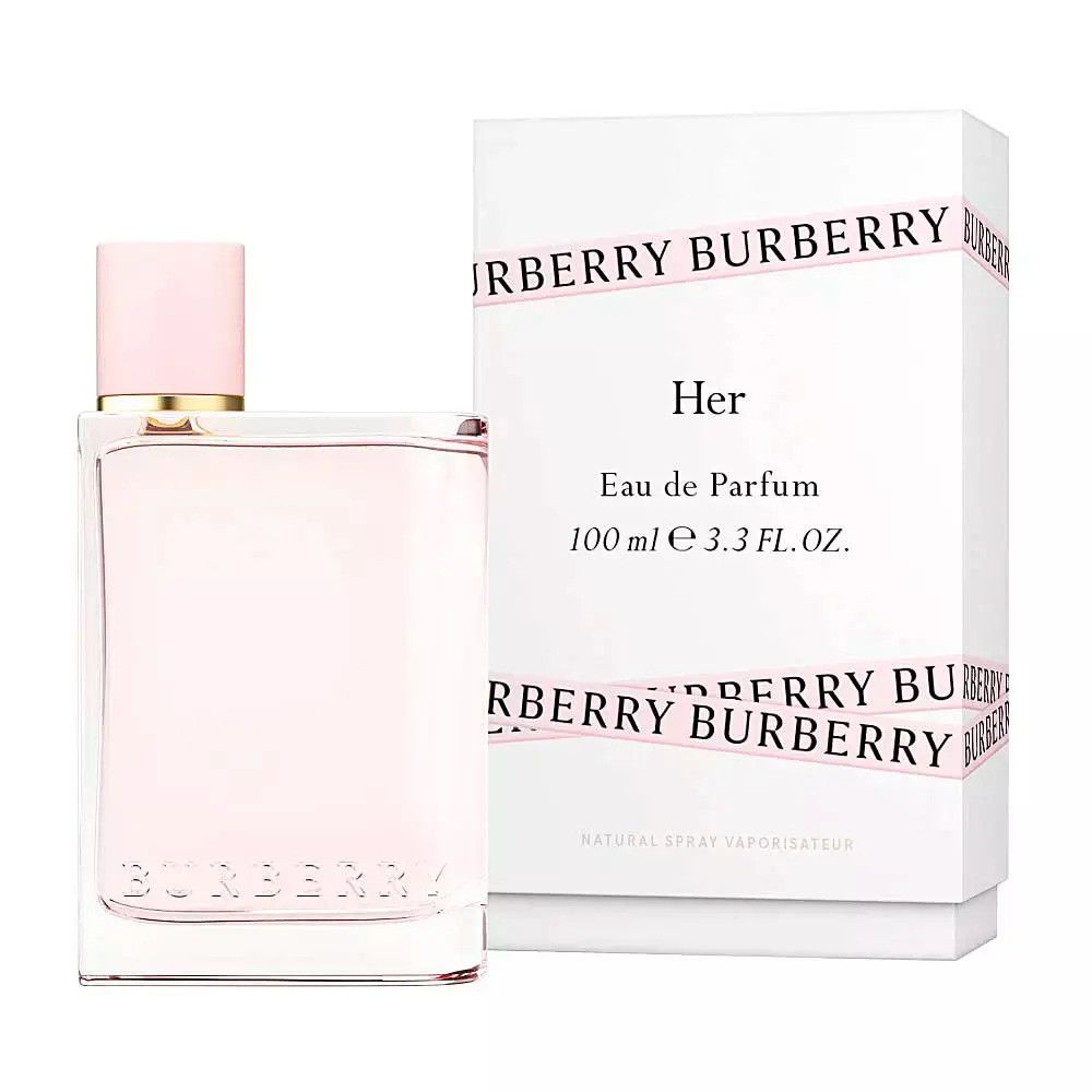 Burberry Her Eau de Parfum Flakon und Verpackung. Rechteckige Flasche, rosa Flüssigkeit. Weiße Schachtel mit Logo und Produktnamen.