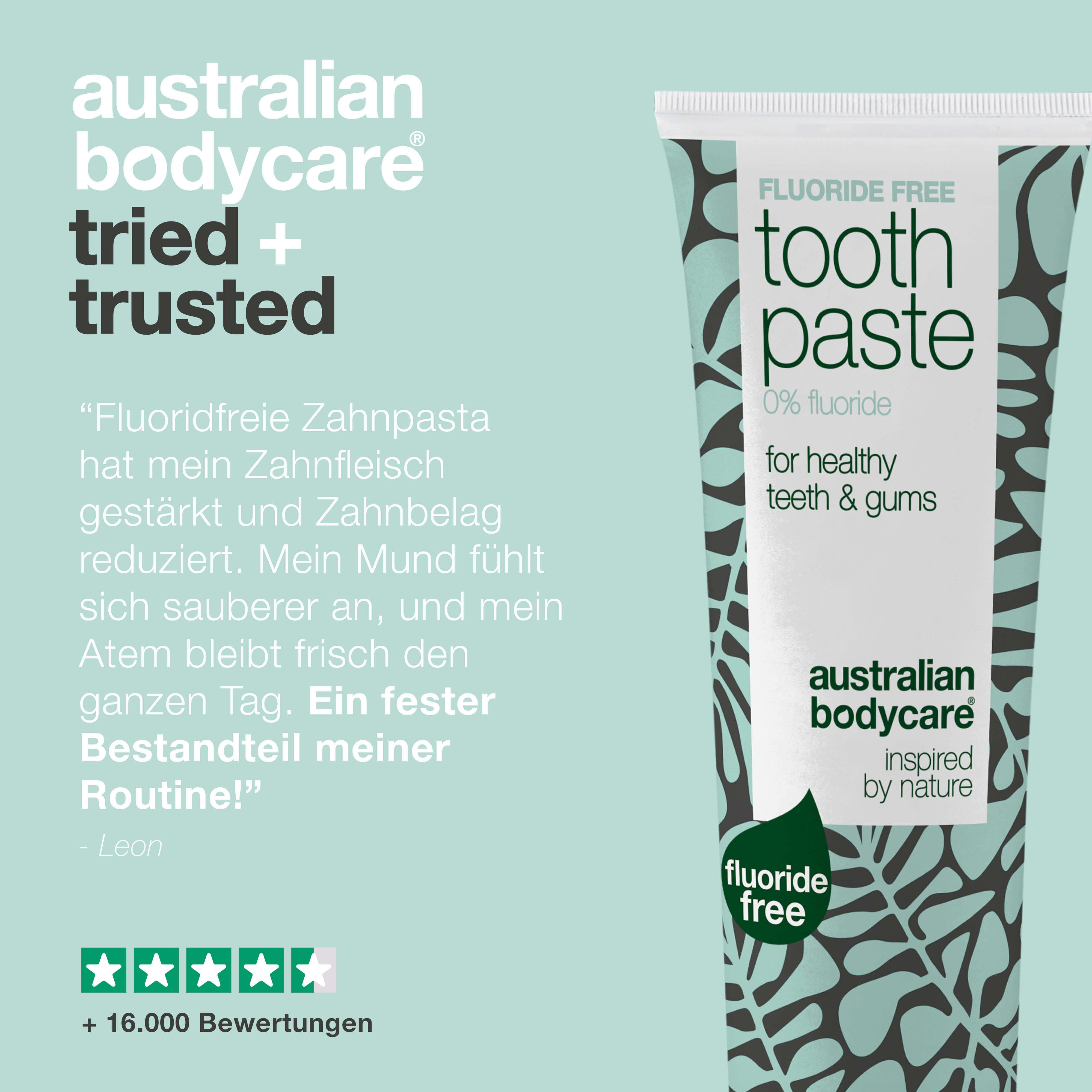Zahnpasta-Tube. Aufschrift: Fluoride Free, Toothpaste, 0% fluoride, für gesunde Zähne & Zahnfleisch. Text: Erfahrungsbericht und Sterne.